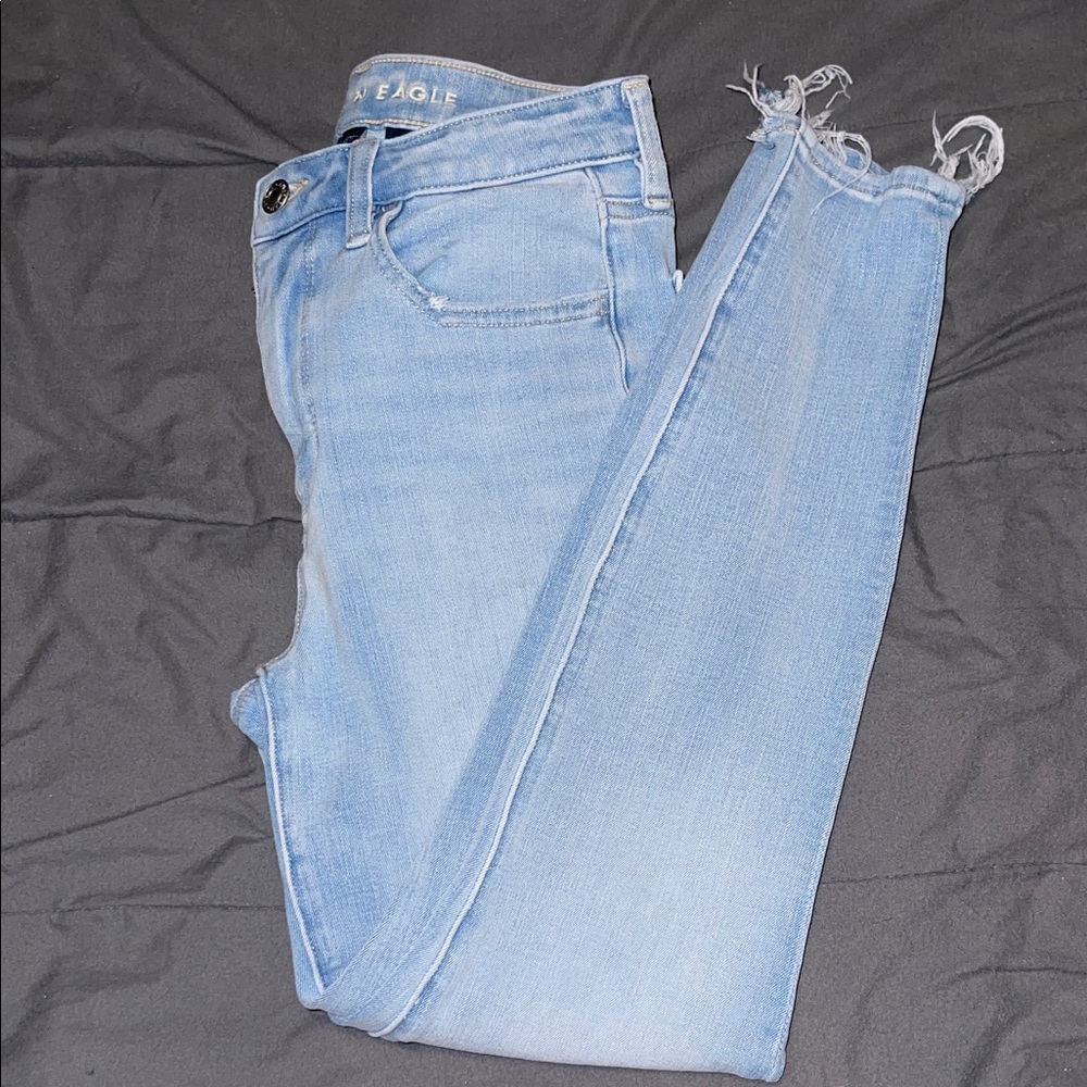 American Eagle Outfitters Light Blue Skinny Jeans with Raw Hem
